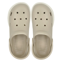 Khaki colored perforated shoes for women in summer thick soled and height increasing new versatile anti slip toe wrapped beach sandals